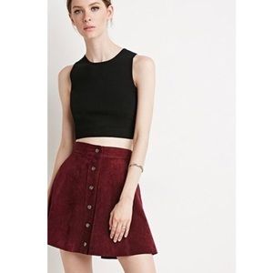 Trendy burgundy suede snap up skirt